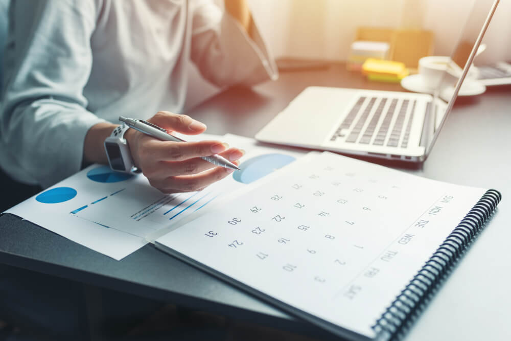 An employee is mapping out the timetable for the 360 rollout. Strategic timing and pacing keep your feedback initiative both relevant and impactful.