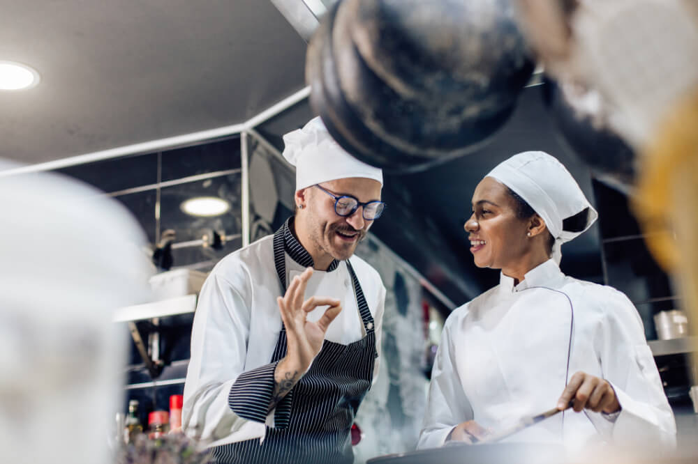 A chef is loving the unique flavours that his team mate is experimenting with. Experimenting open doors to new ways of leading and creating.