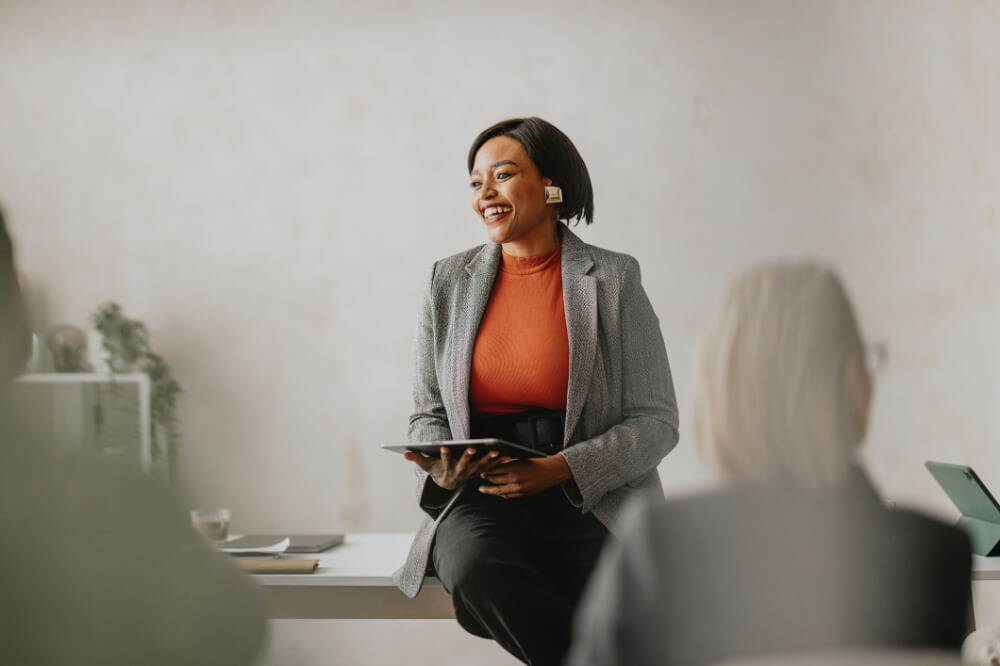 A confident C-suite member is sharing her aspirational goals. Your principles become the compass that guides your biggest decisions.