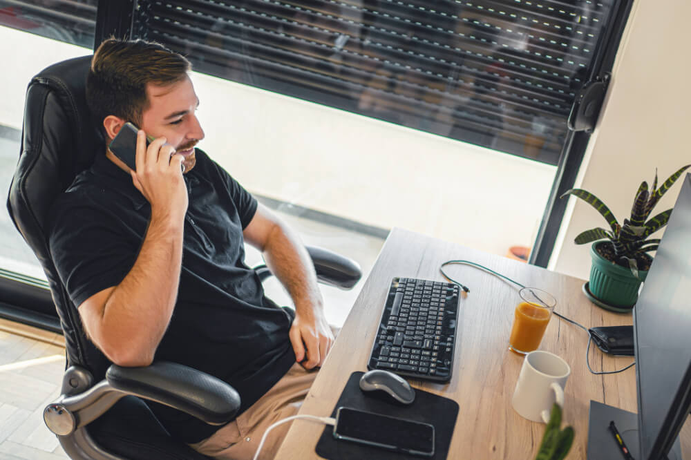 Even seated, your posture speaks—sit upright to stay engaged.