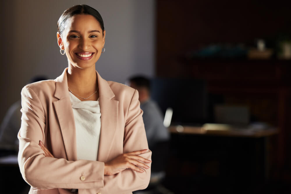 A confident female executive is mastering executive presence and influence. You practice influence in small moments, not just on big stages.