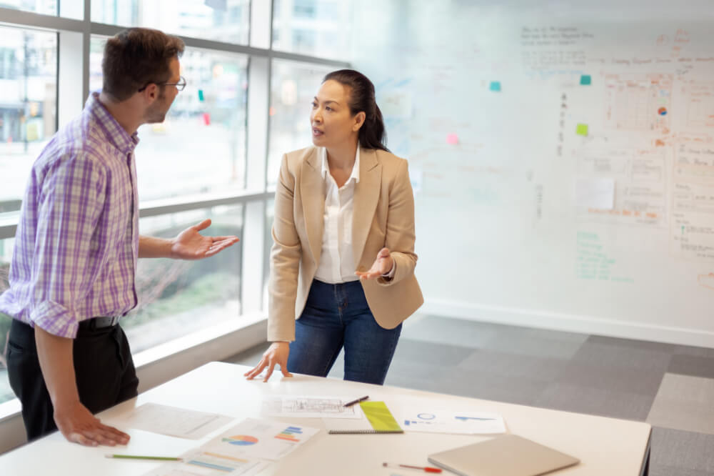 A senior leader is bringing up an issue with her boss. Staying true to your values, even in tough situations, reflects your integrity.