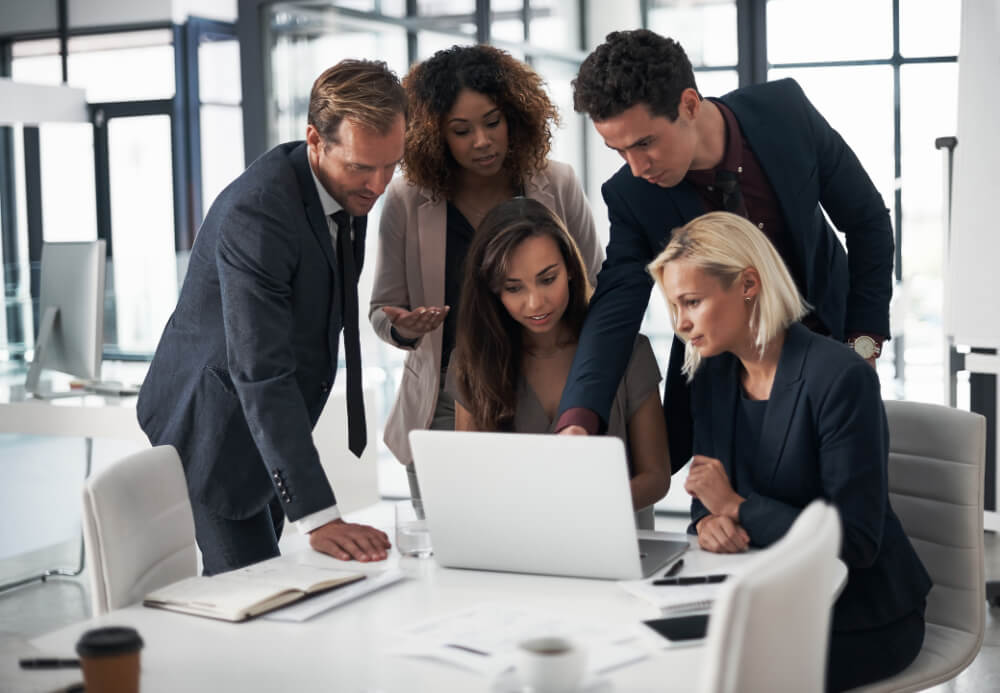 A team is working on the best outcome possible by inviting each other’s viewpoints. Collaboration thrives when all voices are valued, shaping stronger outcomes.