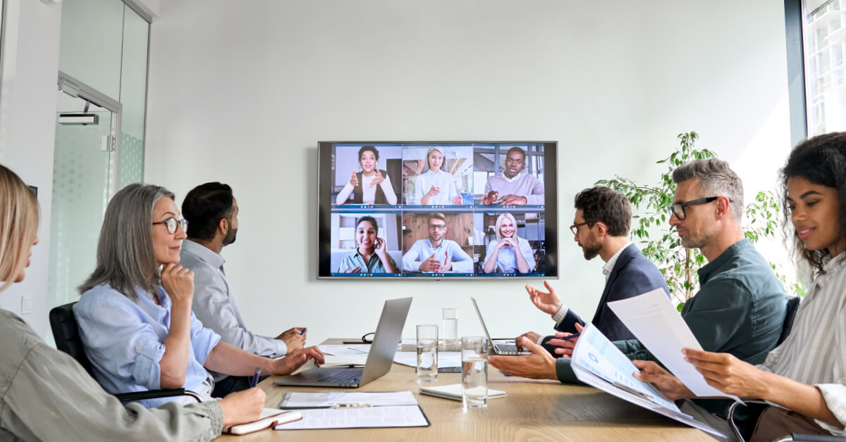 Planning hybrid meetings can be challenging. Read on to discover our best practices to help attendees get the best experience. (Image SE)